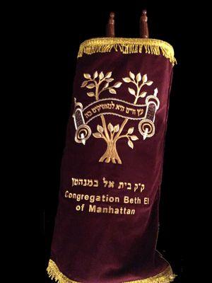 Our Torah Scroll under its lovely cover.