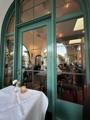 White linen tables and elegant indoor dining