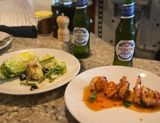 Bib salad with freshly grated Parmesan cheese, artichoke hearts, asparagus and black olives.  Key West Pink Shrimp in a sweet chili sauce.