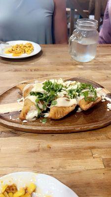 Crab Empanada with Roasted Garlic - Caper Crema