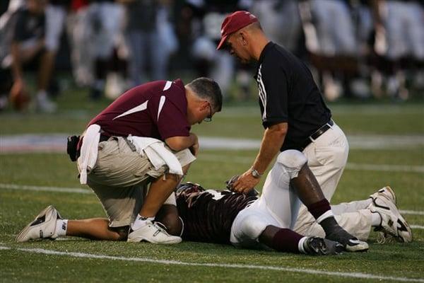 On the Fordham University football field (Dr. Zambetti pictured on right side)