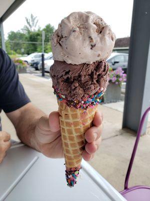 Dark chocolate and peanut butter cup ice cream in a decorated waffle cone.....yum!