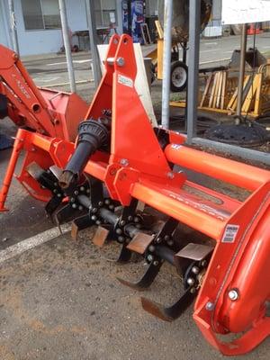 Kubota Tractor Rototiller Attach. (includes tractor) $240/24hrs (8 hrs of use on machine) $25 Trailer w/ chains+binders