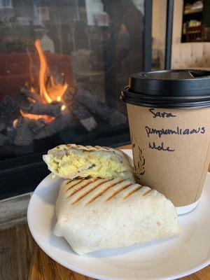 Maple, apple, sausage,egg burrito with pumpkinlicious latte. Both from the fall seasonal menu.