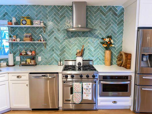 Herringbone backsplash featuring Light Green Thin Brick.