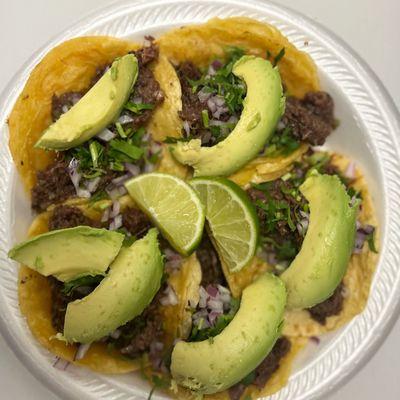 Cabeza mini tacos with avocado.