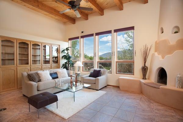 Home Staging 166 Target Rd Corrales - CORT Furniture Rental - Burton Sofa and chair, glass on glass coffee and end table, leather ottoman