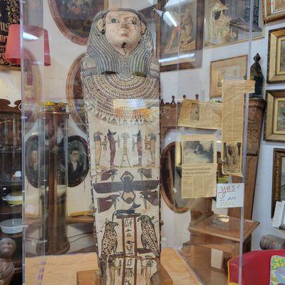 A real sarcophagus encased in glass.