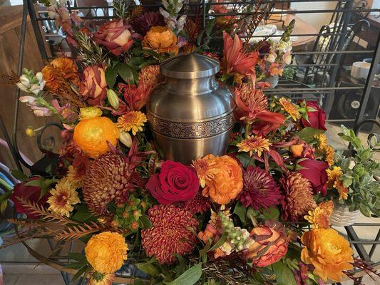 Flowers around the urn