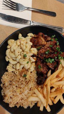 Beef teriyaki with fried rice, macaroni salad, and fries.