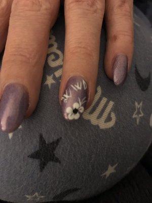 Nail art. Was great the first time I had it done and they were able to paint my husbands initials and a flower.