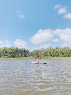 My 9 year old daughter enjoying the SUP from Hot Wax Surf Shop