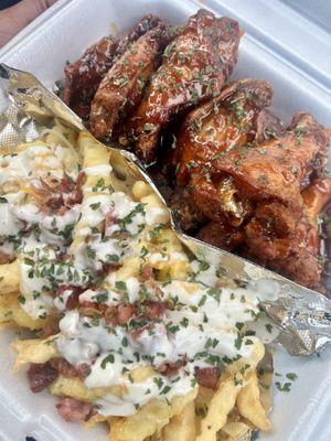 Traditional Wings Combo Meal, mama Berta sauce and bacon ranch fries absolutely delicious