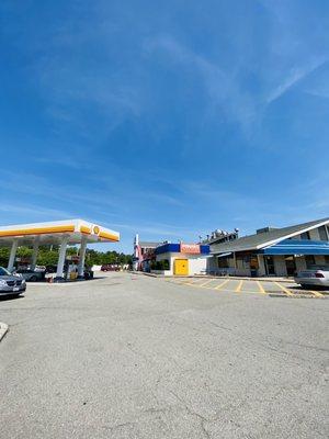 Gas station, restaurant, Popeyes, and travel center inside