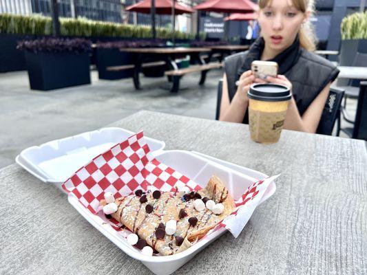 Banana Strawberry Nutella Crepe and Almond Milk Latte in Background