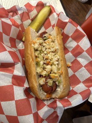 Hot Sausage with pepper hash and slaw. Delicious, snappy skin and filling.