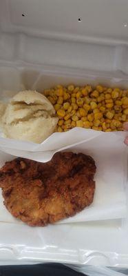 Chicken fried steak with mashed potatoes & corn.