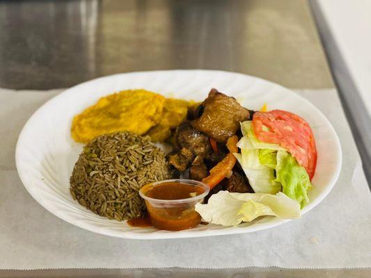 Stewed Turkey with black rice plantain and a side salad