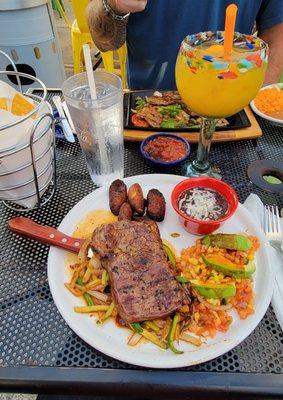 The Garden Steak, with plantain slices and a Mango Margarita.