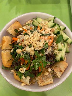 Noodle salad bowl come with egg-rolls