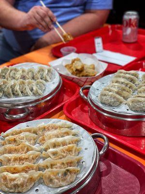 Traditional dumplings (steamed and fried), beef dumplings and kimchi dumplings.