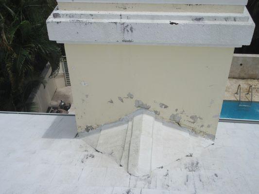 Flying Debris Damages to a chimney on a roof