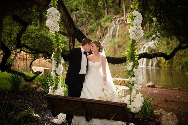 Bride and groom under century oaks