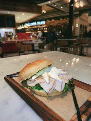 Panino (focaccia, turkey, mozzarella, basil aioli, arugula)