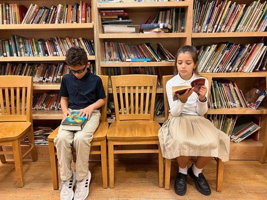 Children reading in our fabulous library