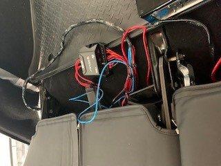 Horrible wiring of amp and back up camera sitting in my cargo area of Jeep