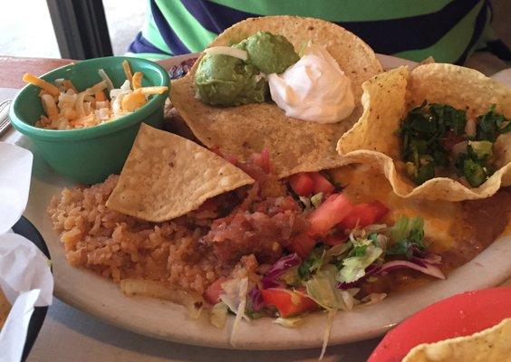 Can you find the chicken in the chicken fajita's? That's extra guac & cheese on the side. $2.50 each!