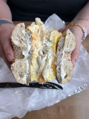 Eggel with Meat & Cheese- Sausage, Egg and Cheese with Scallion Cream Cheese on a Sesame Bagel