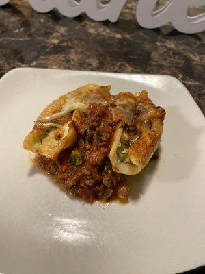 Italian Cheese and Spinach stuffed shells topped with a homemade marinara.