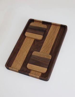 A serving tray and coaster set we made from the beautiful wood we bought from their shop!