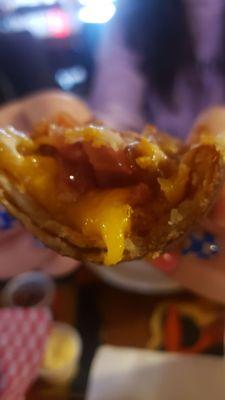 Look at the cheese on this potato skin