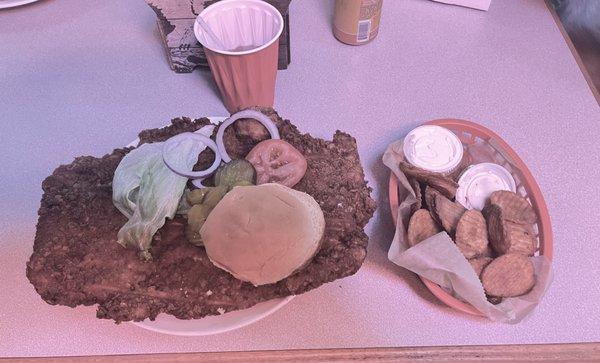 Breaded Pork Tenderloin and fried potato slices