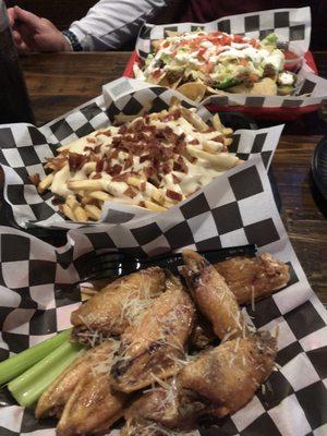 Nachos, loaded fries, garlic Parmesan chicken wings