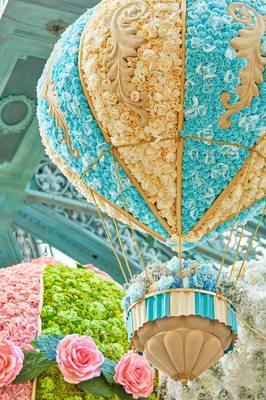 Taking floral design to new heights!  Our stunning hot air balloon adorned with vibrant flowers would elevate any space.