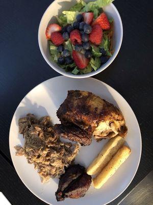 Peruvian roasted chicken, roasted pork, yucca, plantains Side salad-we added berries ourselves