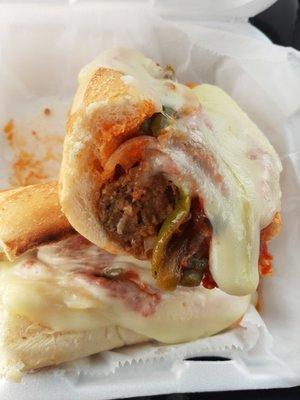 The Big Bubba lunch special: Roll stuffed with meatballs, grilled peppers, fried onions, marinara sauce & 
 melted mozzarella cheese