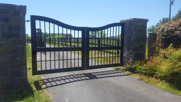 Driveway entrance gates, custom made to home owner specs. Gate operators, access control