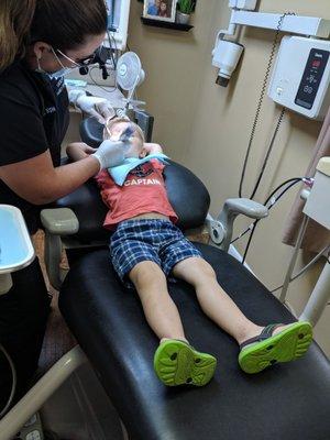 My 3 year old getting his teeth cleaned and loving it.