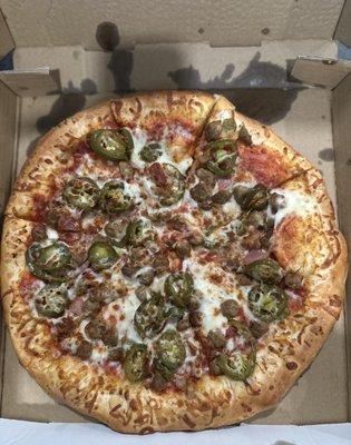 Jalapeño, Bacon and Sausage. Doughy pizza.