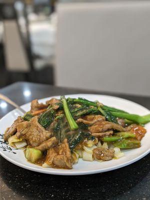 Stir fried flat rice noodle with beef and Chinese broccoli