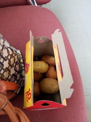 Assorted timbits.. fresh and DELICIOUS.. Yes I ate 8 out of the 10, since I shared 2 with Howard owner of Tuffy :)