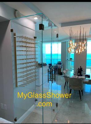 Glass frameless wine closet with wine racks