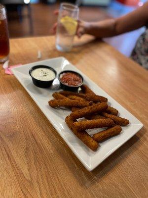 Fried zucchini strips. They offer you both ranch and marinara sauce. Yummy.