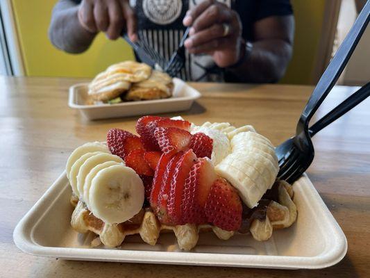 Nutella waffle with fresh strawberries and banana! Look at that fruit, just perfect!