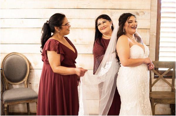 I love this photo of the bride and mother and sister. We also had the honor of helping.