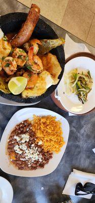 molcajete with onions and jalepeno cooked well on the side